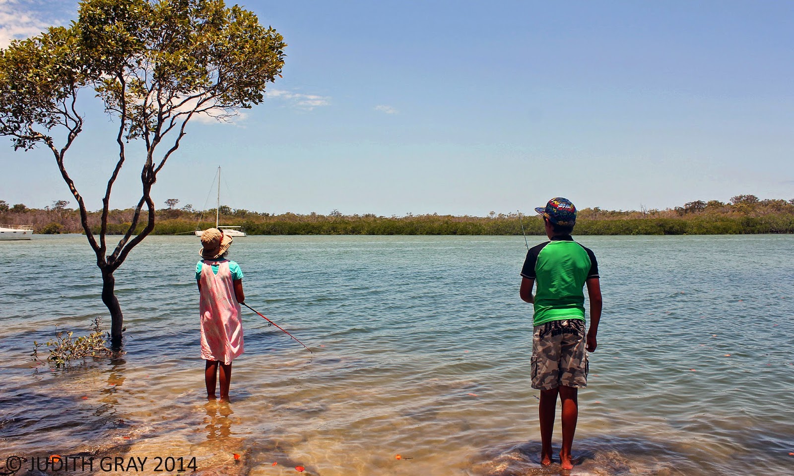 Family fishing at Crab Creek Park, Tin Can Bay