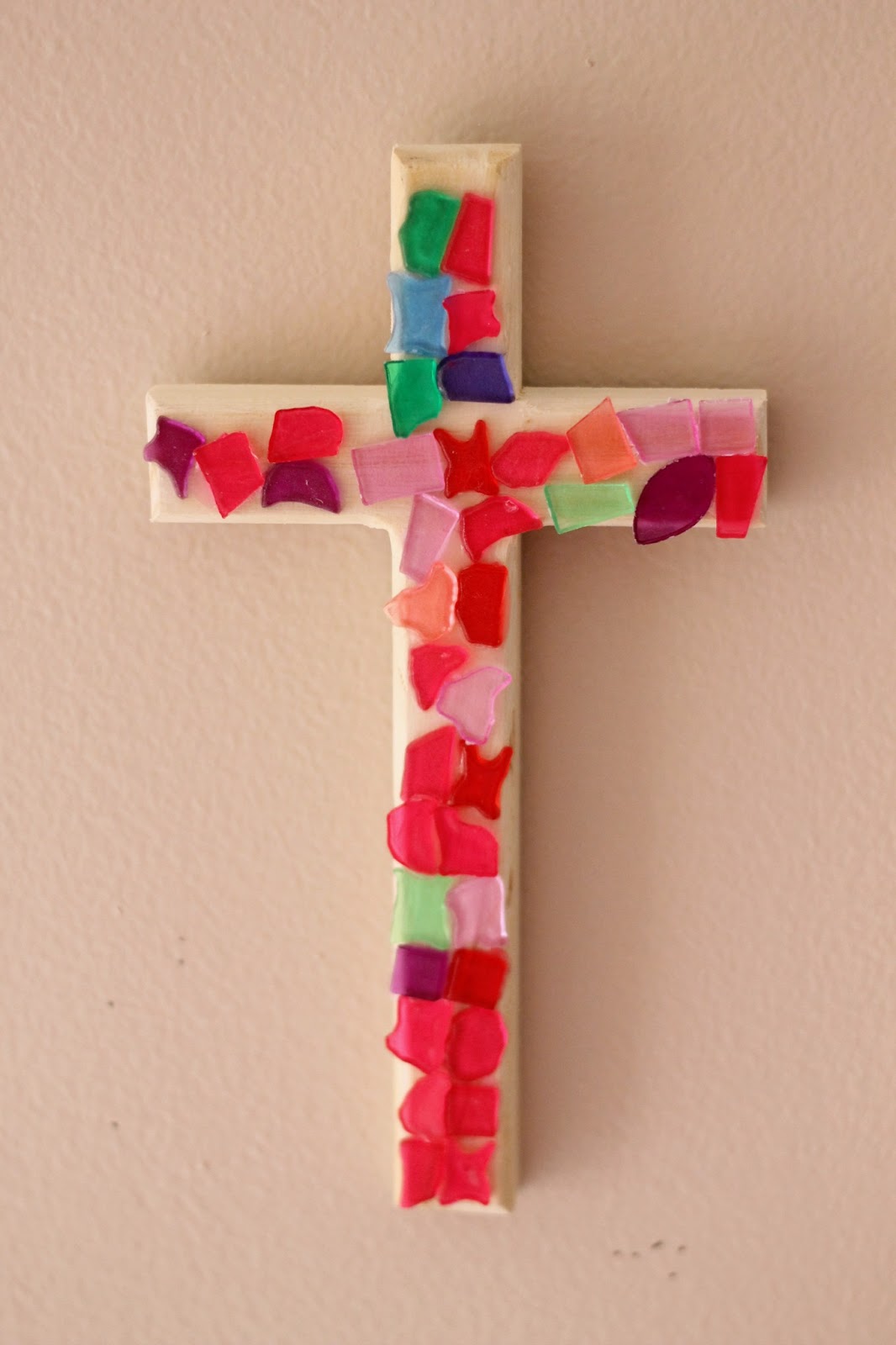 Easy and inexpensive mosaic crosses kids can make to give as gifts for Easter or Mother's Day
