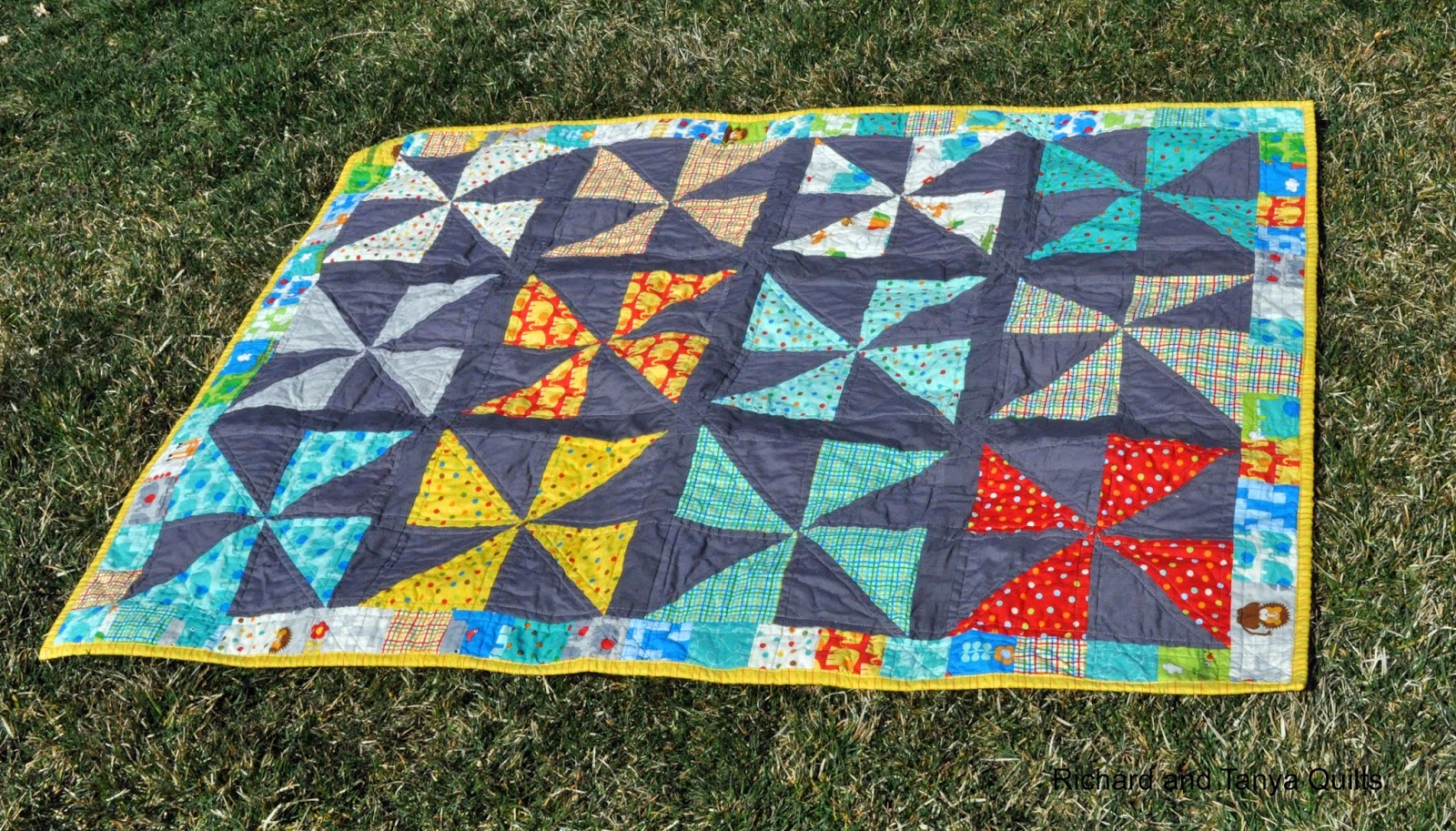 Richard and Tanya Quilts Pinwheel Quilt with Scrappy Border