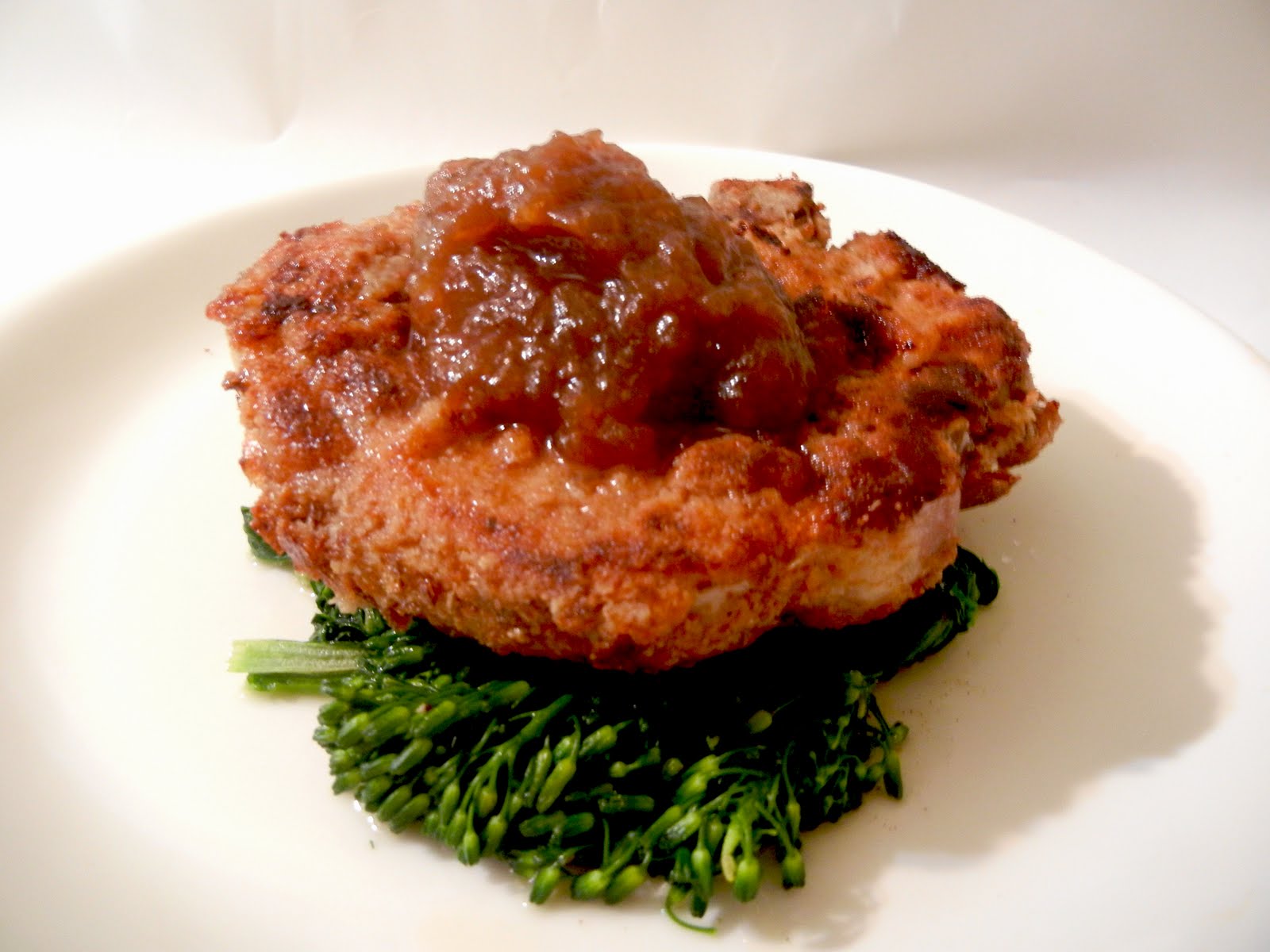 Breaded Pork Chop with Rhubarb Jam and Sauteed Greens