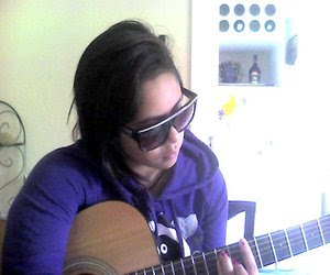 Me, myself and I... having a jam on the guitar.