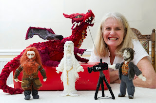 Denise Salway with some of her creations hobbit-knitted-model-collection