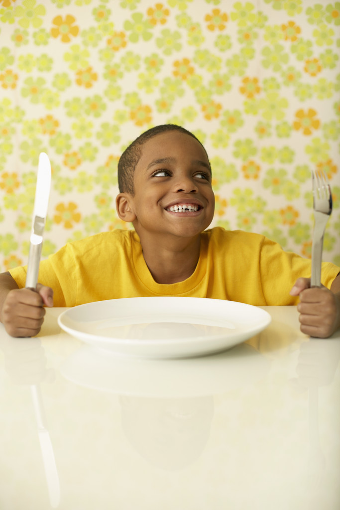 Child Eating Breakfast