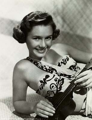 Debbie Reynolds was pretty cute and here she is posing with a ukulele in the
