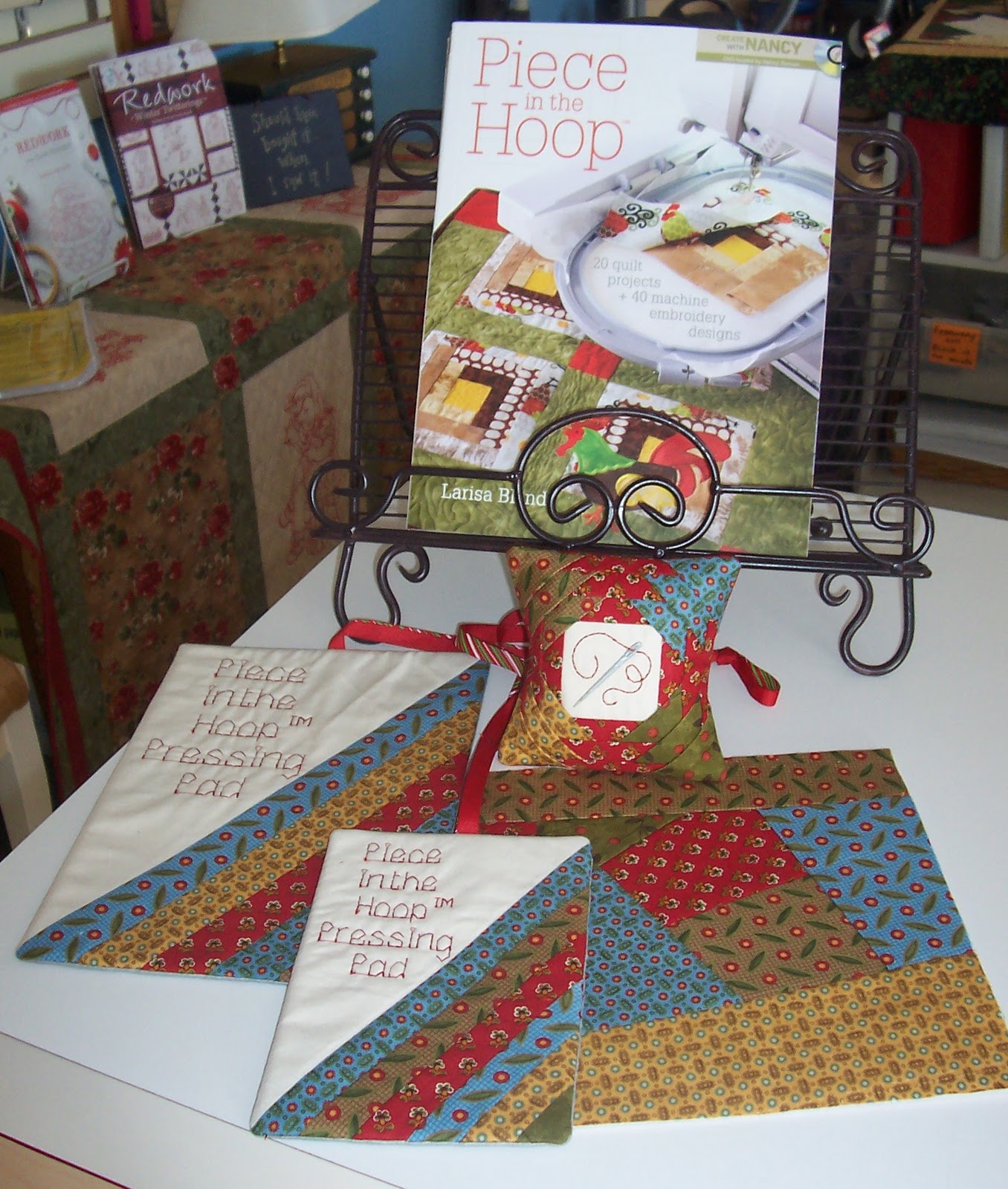 The pinecone press machine embroidery retreat  piece in the hoop projects