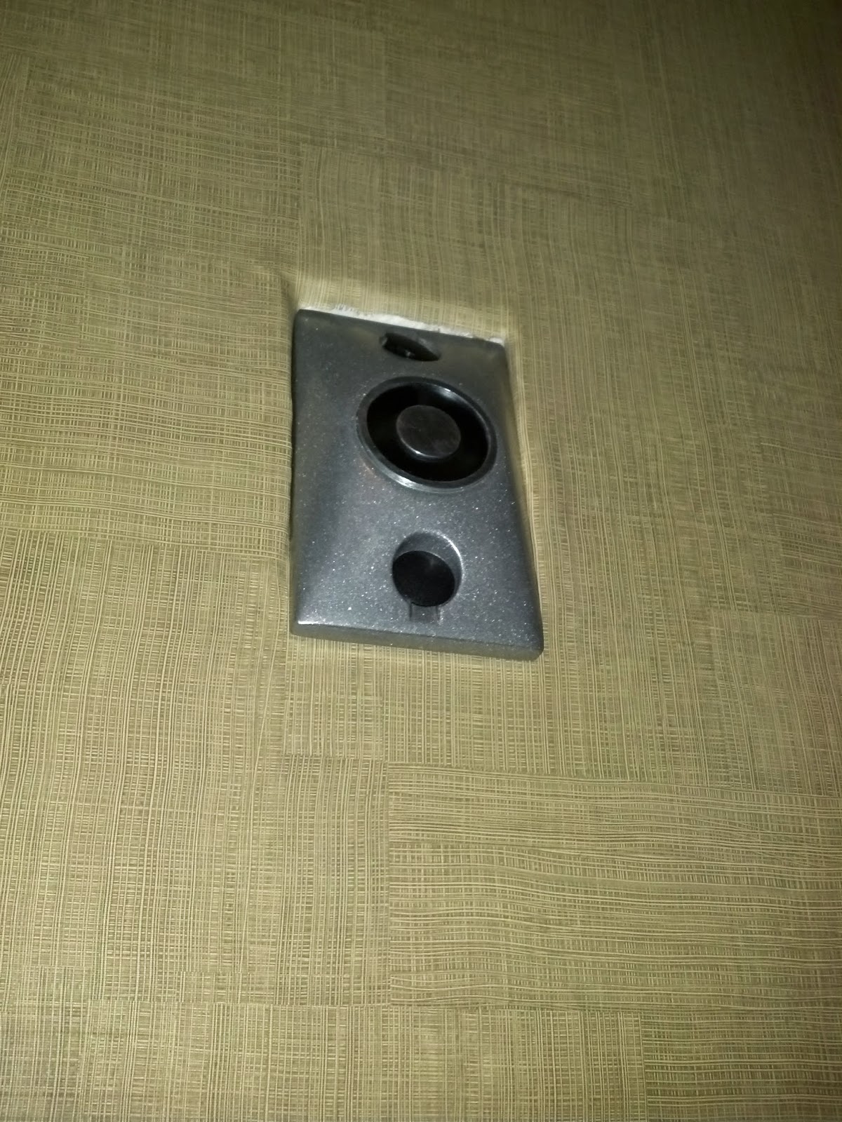 Fire Alarm Door Holder Pushed into Wall