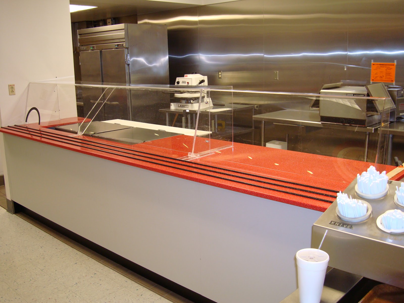 Acrylic Evolution Custom Sneeze Guards for Food Prep and Display area..