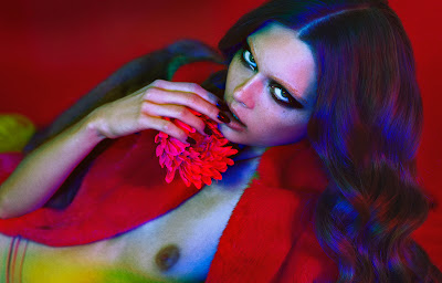 woman with flower near lips, red fur, georgiana saraev model, 