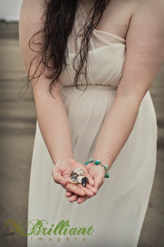Alyssa holds seashells at Long Beach - Brilliant Imagery Bride holds seashells at Long Beach - Patricia Stimac, Seattle Wedding Officiant