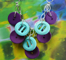 Purple Diva Necklace Plunging Necklace has Double Layers of Teal and Purple Fashion Buttons Hanging from Strands of Silver Chain