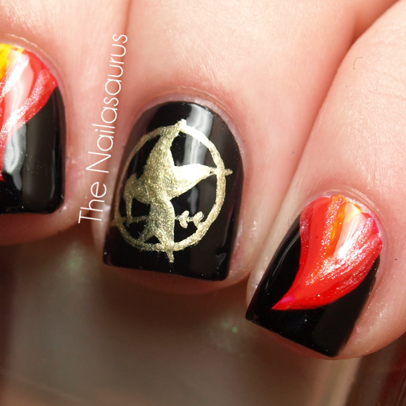 I did some Hunger Games nail art back in July last year while I was reading