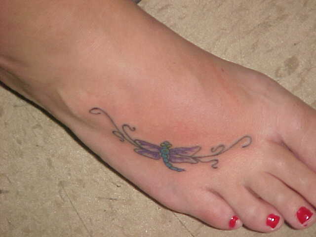 heart tattoo on foot. foot tattoo designs for