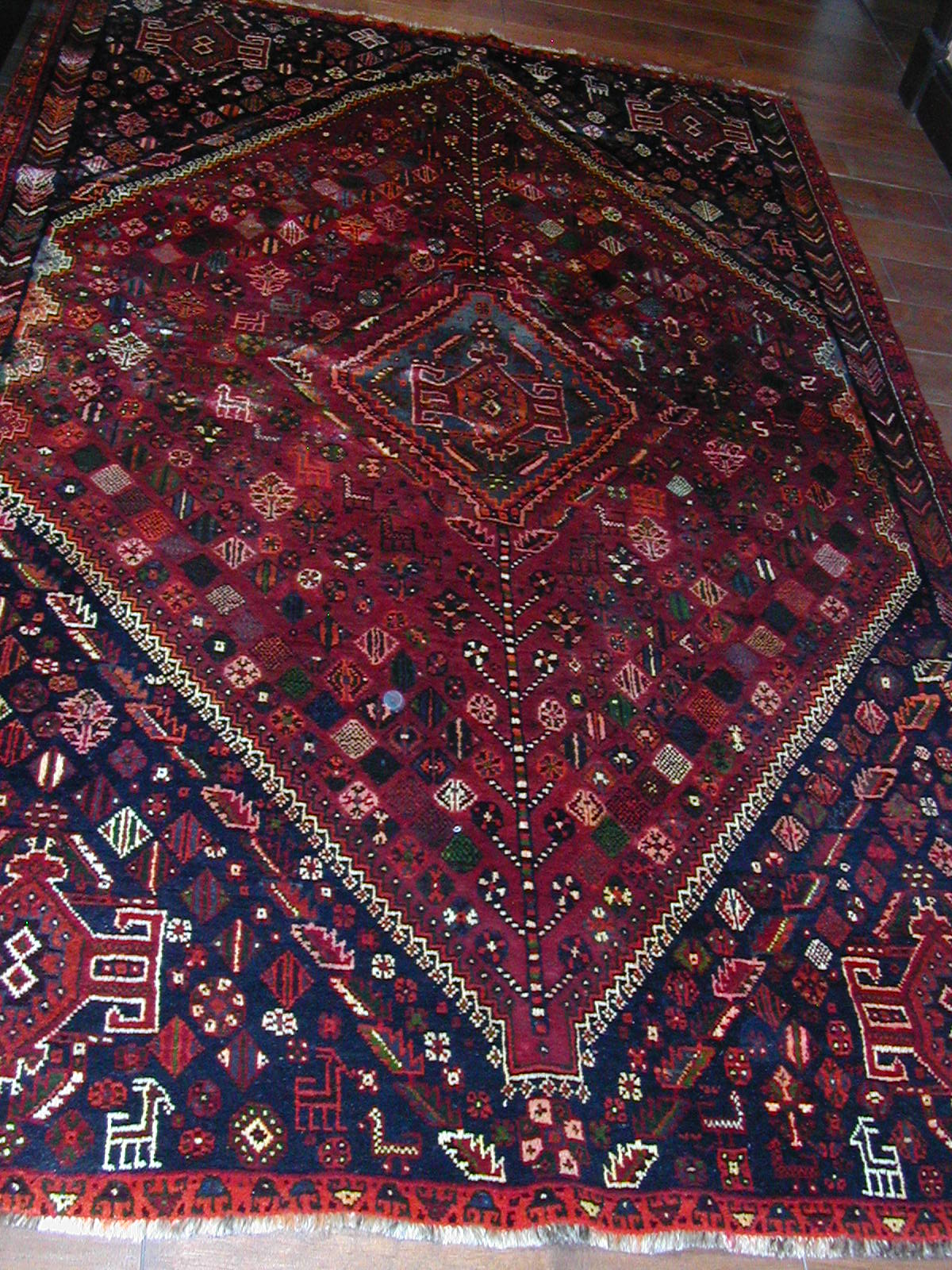 UnderCoverRugLover Symbols found in a Persian Qashqai tribal rug.