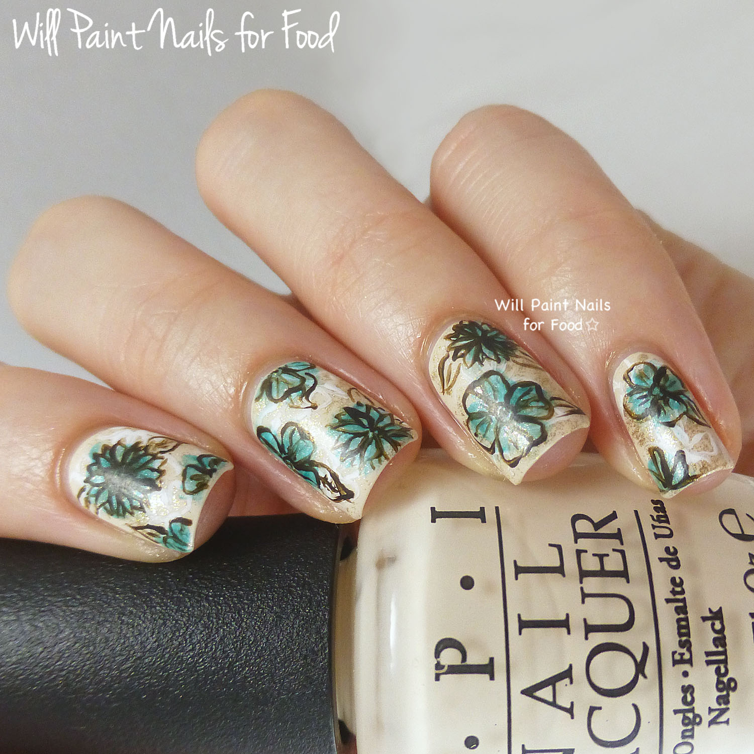 Vintage-inspired freehand floral nail art