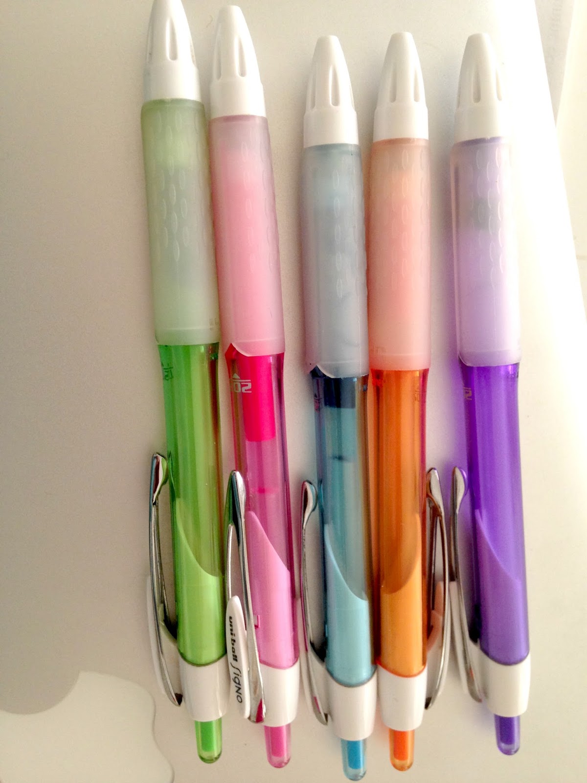 In a lab coat choosing the best colored pens