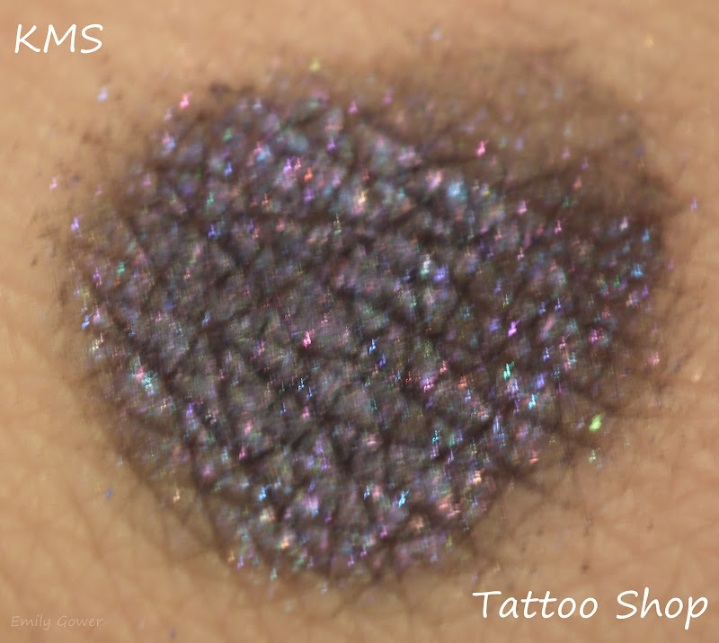 Tattoo Shop - A rich black with a lot of purple and blue sparkles. title=