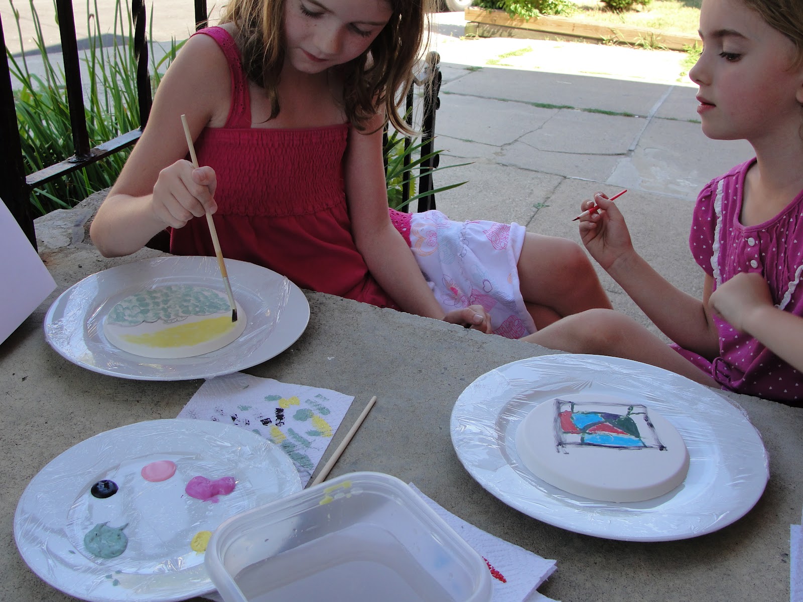 Kids Get Arty creating a fresco with kids
