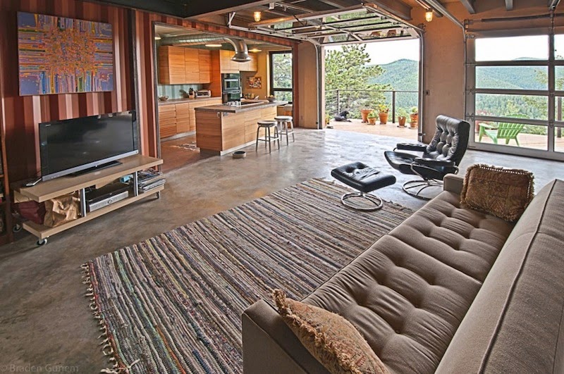 8.) This open concept was taken a step further with a sliding garage door. - All You Need is Around $2000 to Begin Building One of These Epic Homes – Made From Recycled Shipping Containers! 8.) This open concept was taken a step further with a sliding garage door. - All You Need is Around $2000 to Begin Building One of These Epic Homes – Made From Recycled Shipping Containers!