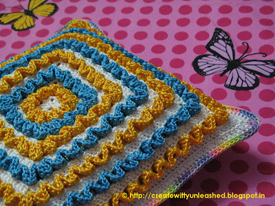 Crochet wiggles square cushion 3