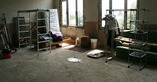 More stuff gets moved into the living room More stuff gets moved into the living room