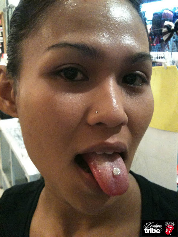 Tongue piercing title=