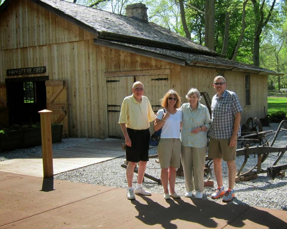 John Deere Homestead Matt, Lynne, and Tony & Mary Drobnik in front of the barn/forge