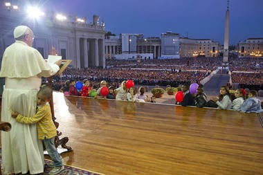 THE CHILD WHO HUGGED THE POPE.