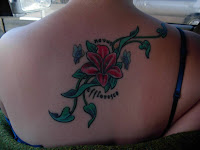 Butterfly and Flower Tattoos on Back Butterfly and Flower Tattoos on Back