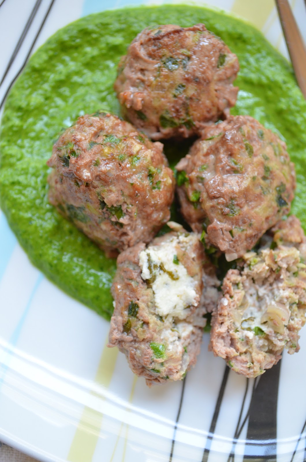 iron stef goat cheese stuffed lamb balls with spinach cumin pesto