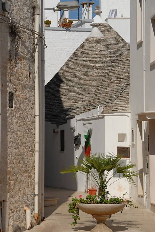 Alberobello a Unique Italian Village Alberobello, the city of drystone dwellings known as trulli , is an exceptional example of vernacular architecture. It is one of the best preserved and most homogeneous urban areas of this type in Europe. Its special features, and the fact that the buildings are still occupied, make it unique. It also represents a remarkable survival of prehistoric building techniques.