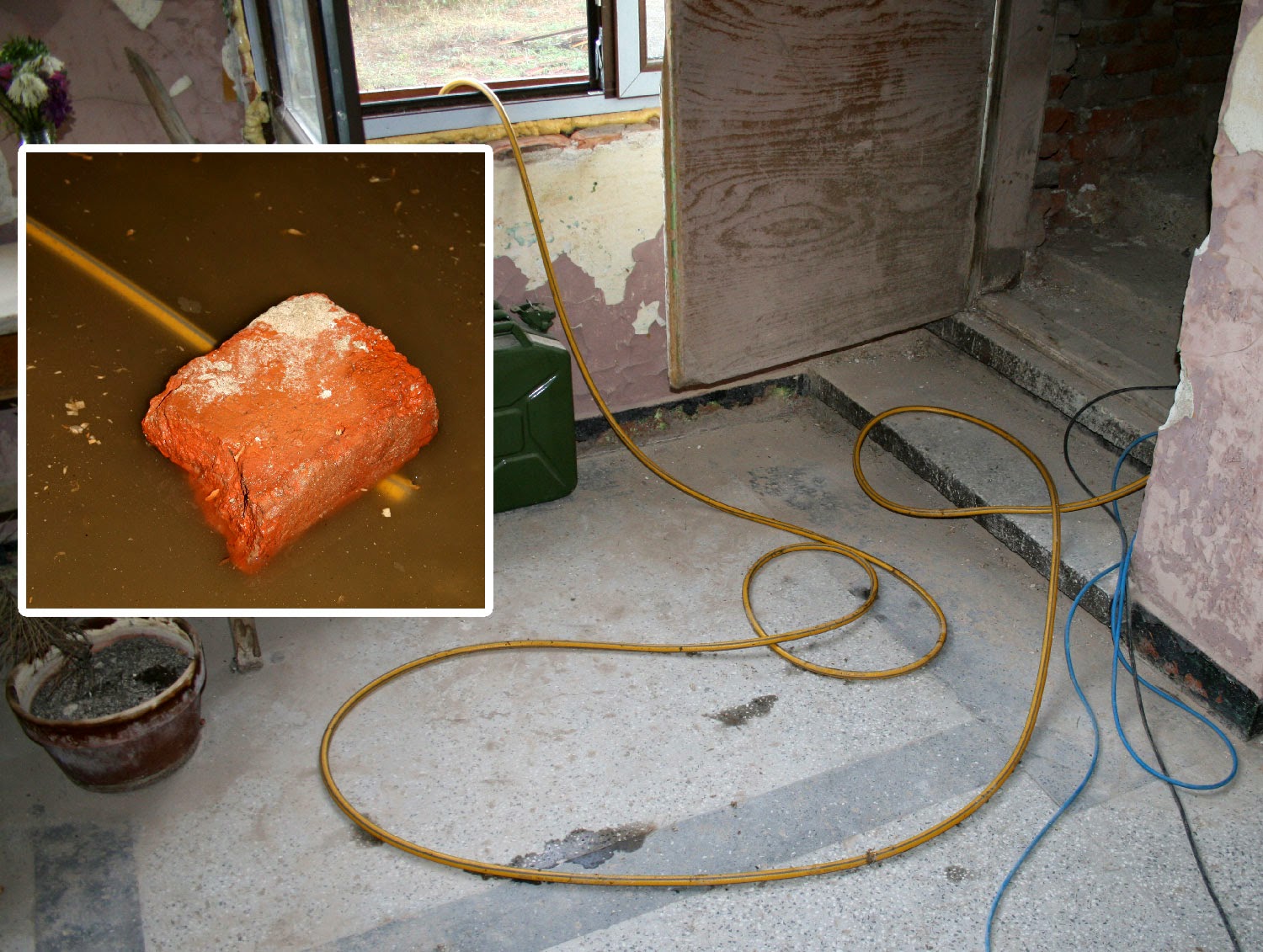 The hose is used to clear some water The hose is used to clear some water
