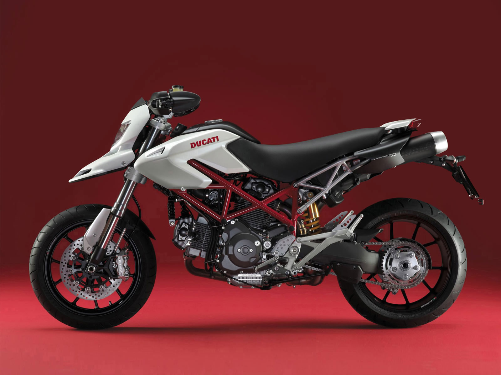 http://4.bp.blogspot.com/-4DqE0M7OYjg/To0sMedZK6I/AAAAAAAABm8/SKC33hRJQqw/s1600/ducati_hypermotard_2009_motorcycle-desktop-wallpaper_1.jpg