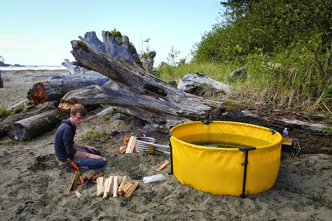 Here's The Original Nomad's awesome hot tub. - This Camping Accessory Is The Best Invention Ever, You'll Be So Jealous Here's The Original Nomad's awesome hot tub. - This Camping Accessory Is The Best Invention Ever, You'll Be So Jealous