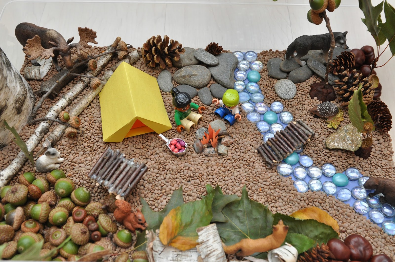 Creative Projects for Kids Lego Men Are Going Camping Sensory Bin