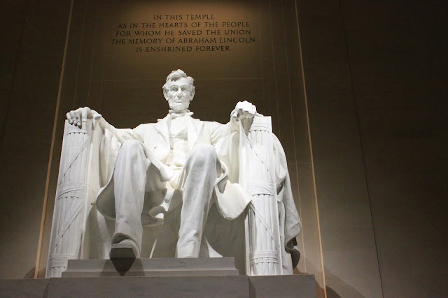 The front view of President Abraham Lincoln at Lincoln Memorial in Washington DC, USA The front view of President Abraham Lincoln at Lincoln Memorial in Washington DC, USA