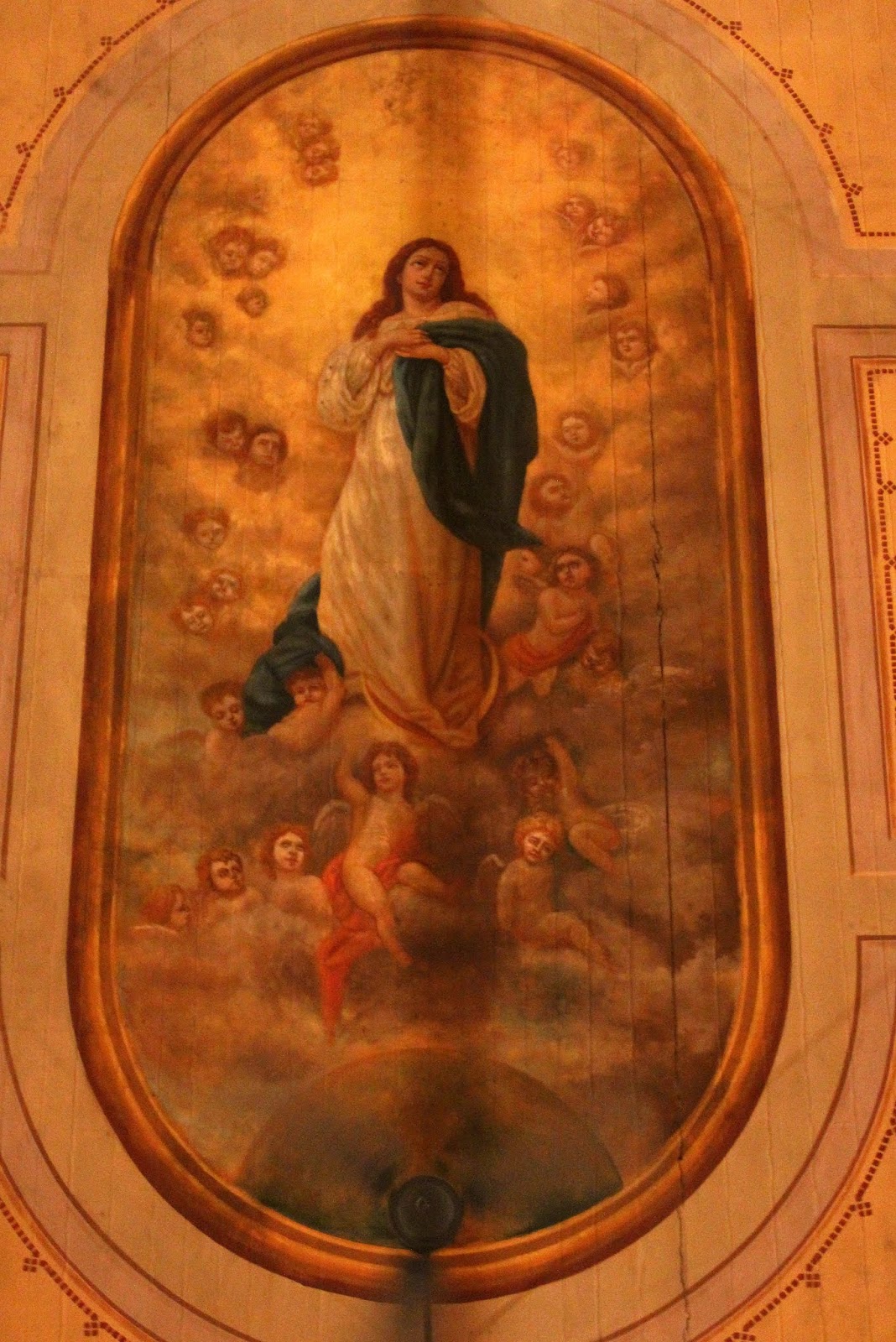 Central ceiling mural View of Central ceiling mural hovers above the pews