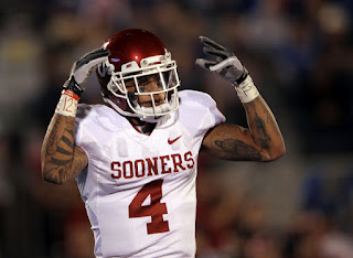 Kenny Stills #4 of the Oklahoma Sooners celebrates after scoring the game's first touchdown against the Kansas Jayhawks during the game on October 15, 2011 at Memorial Stadium in Lawrence, Kansas. (October 14, 2011 - Source: Jamie Squire/Getty Images North America)