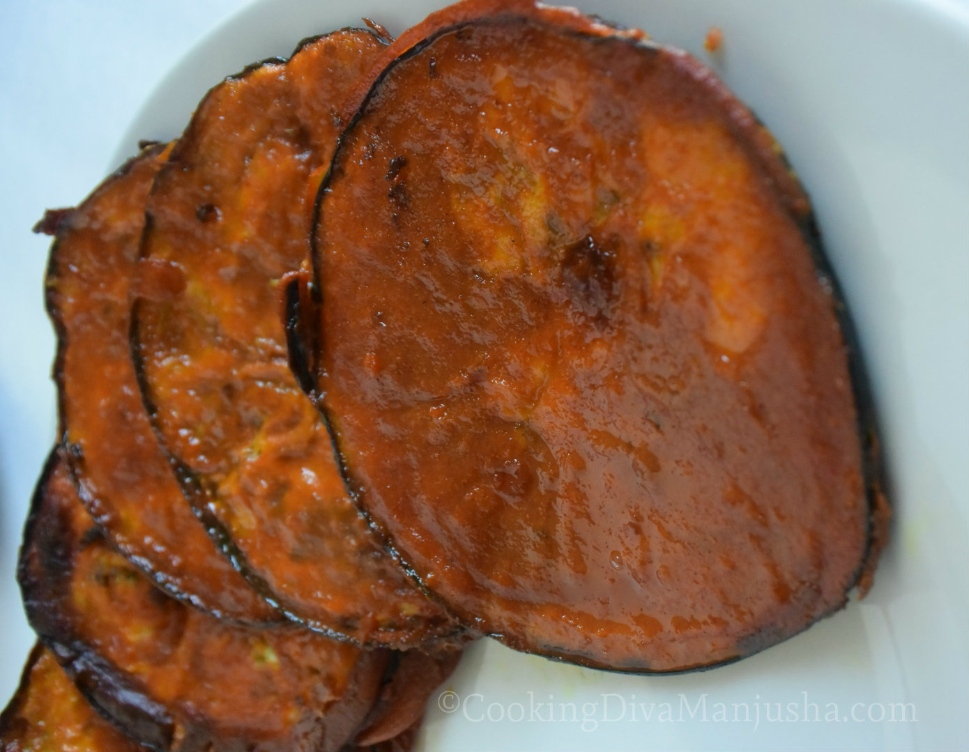 Baigun BhajaBaingan fry Bengali styleEggplant fritters
