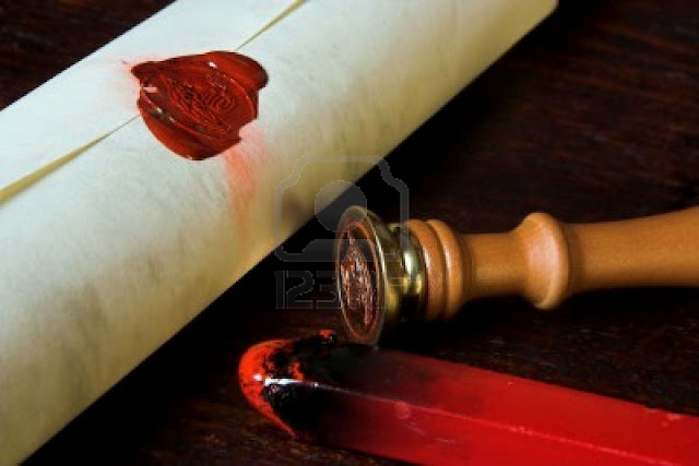 parchment scroll with a red seal