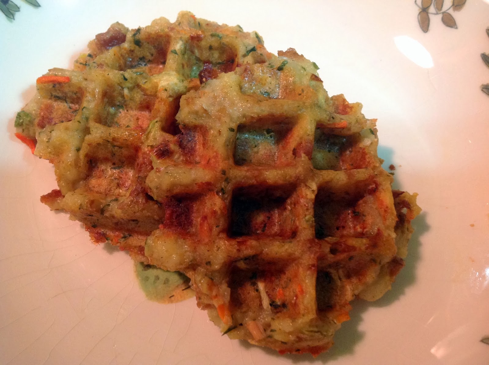 A Couple in the Kitchen Stuffing Waffles Topped with Turkey and Gravy