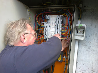 John continuing the scheduled inspection of electrical systems