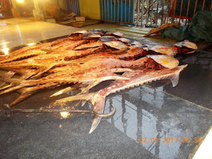 The art of slicing fish in New Market.