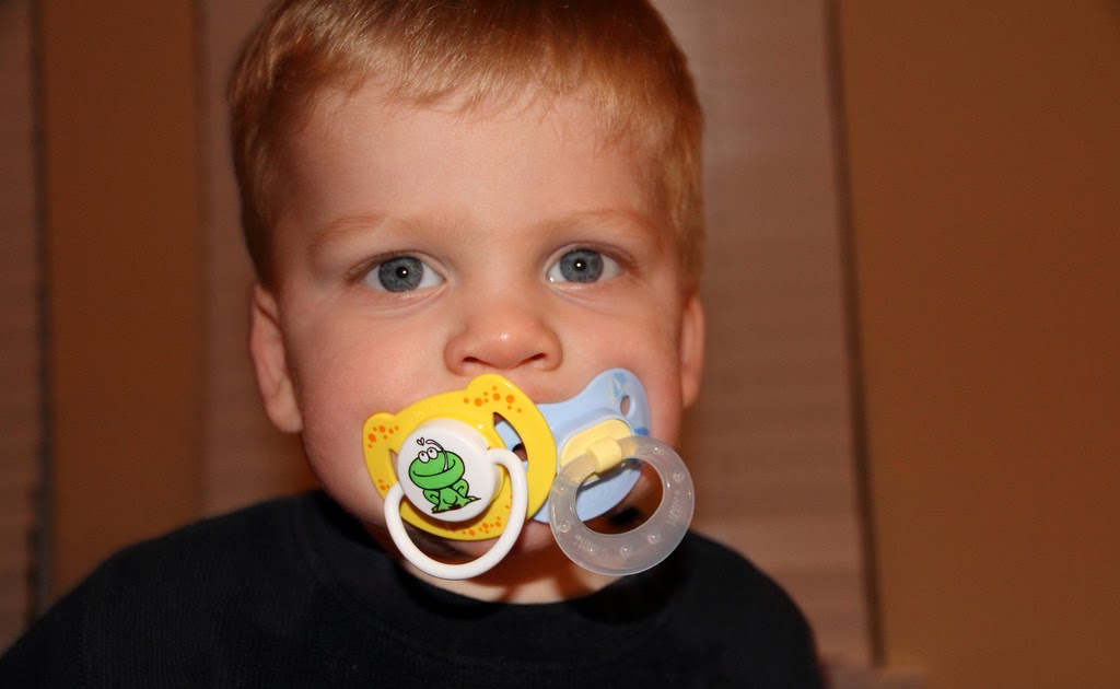 The Ollenberger Family How many pacifiers can fit in one mouth?!