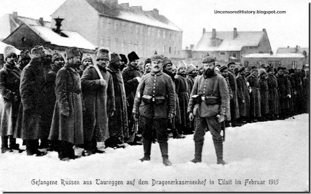  Russian POW in Tilsit with two burly German guards WW1