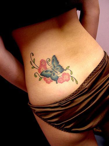 cute flower tattoos. cute flower tattoo with butterfly