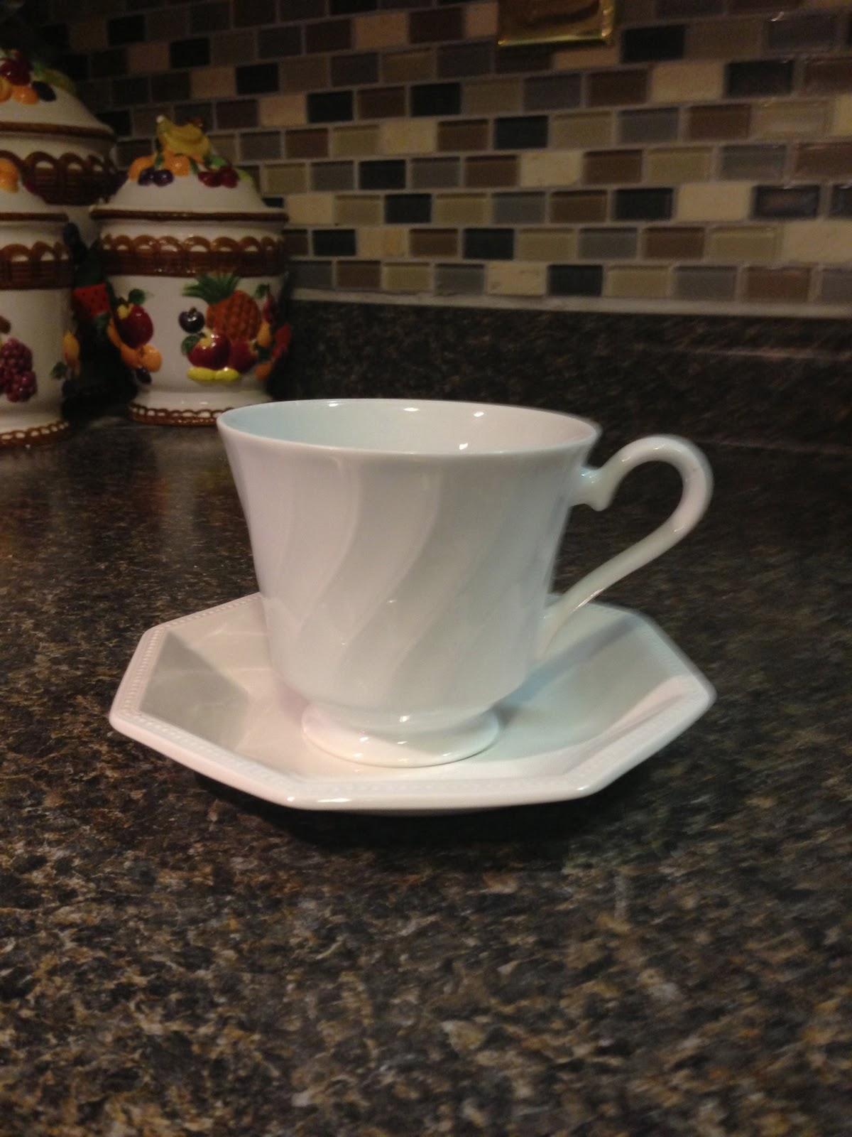 The Nifty Thrifty Family Thrift store tea cups and tea pots