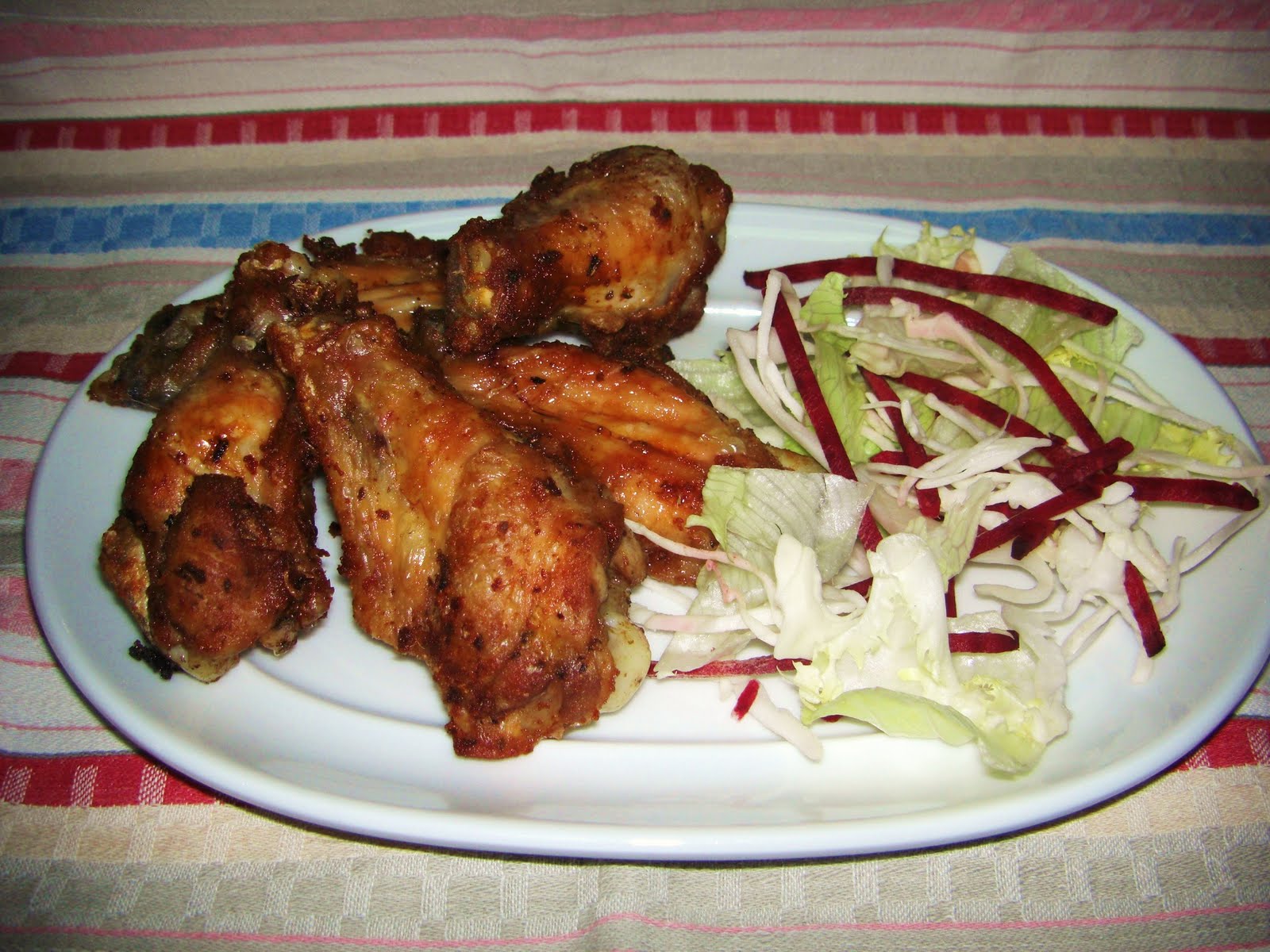 Amb 'P' de Pòrtula RS ALETES DE POLLASTRE CRUIXENTS