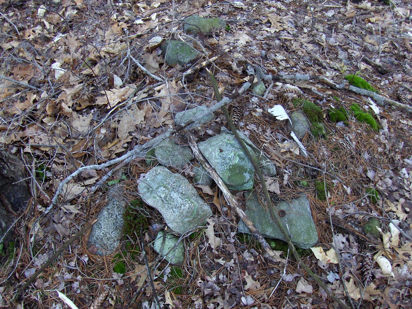 Rock Piles Lincoln Landfill small rock piles by a spring