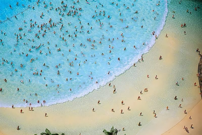 Aerial Photography | Alex MacLean Holidaymakers in the pool of Orlando, Florida, USA.