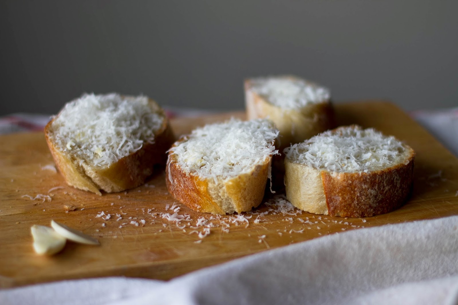 Buttered Up Baked Eggs in Stewed Tomatoes with Caramelized Leeks